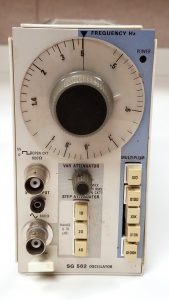 Tektronix SG502 oscillator module for precise frequency testing.