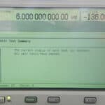 Test equipment screen showing frequency 6 GHz and successful self-test results.