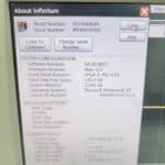 Infiniium oscilloscope system info display with model and firmware details.